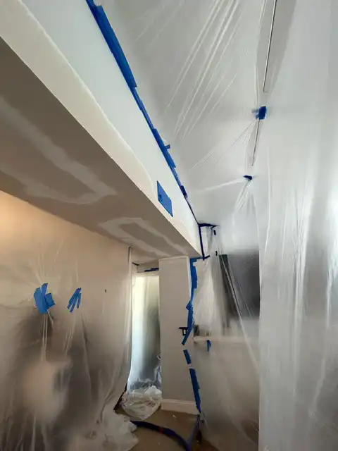 Small soffit water damage repair. Finish items protection, Demolition, drywall hanging, taping, corners application, matching existing texture and clean up. 2026 project photo
